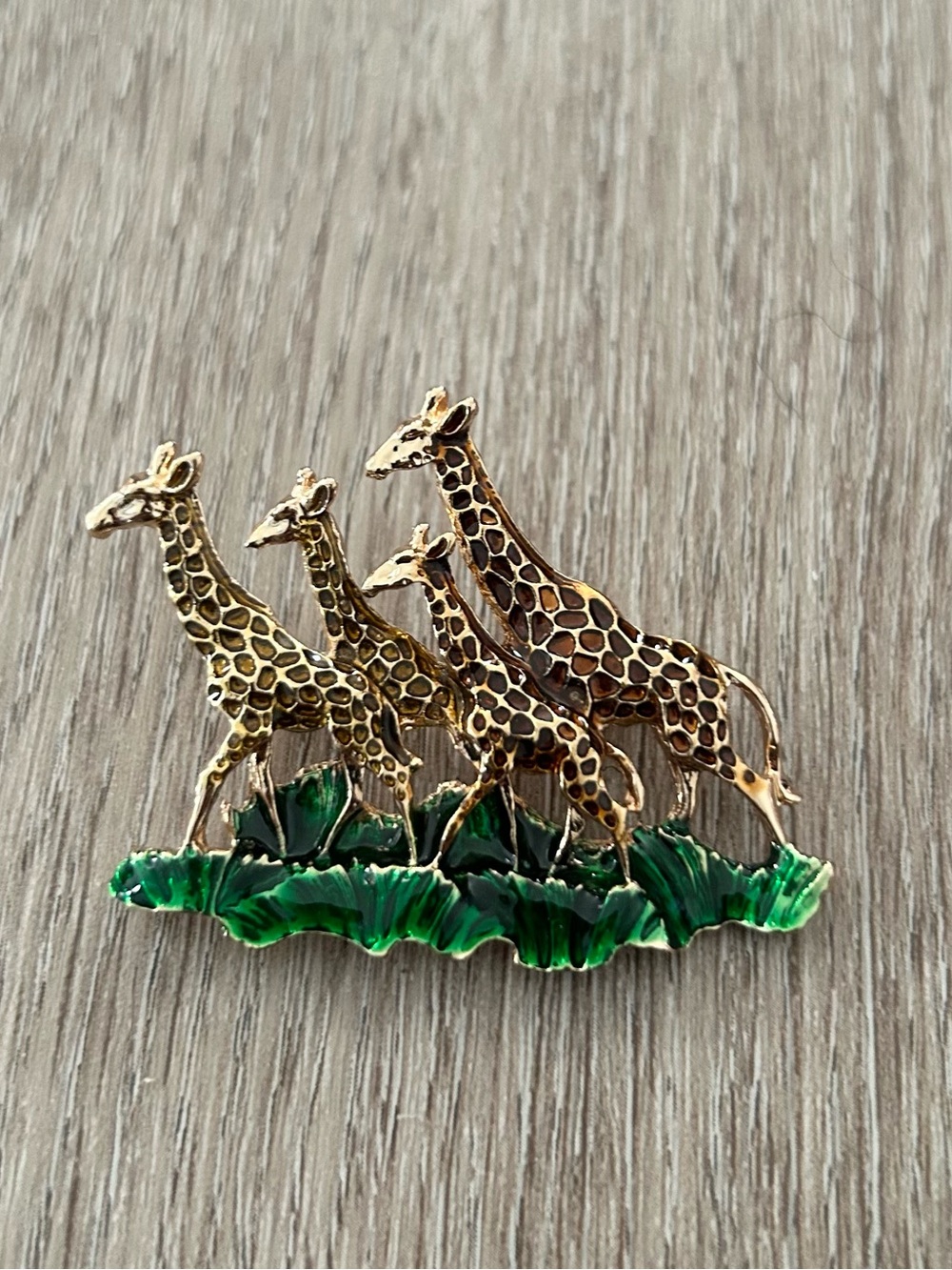 Gold Giraffe Family Brooch with Green Grass